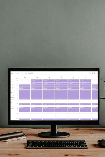 desktop with a time blocked week in google calendar