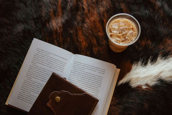 Cozy office layout with a book and leather journal